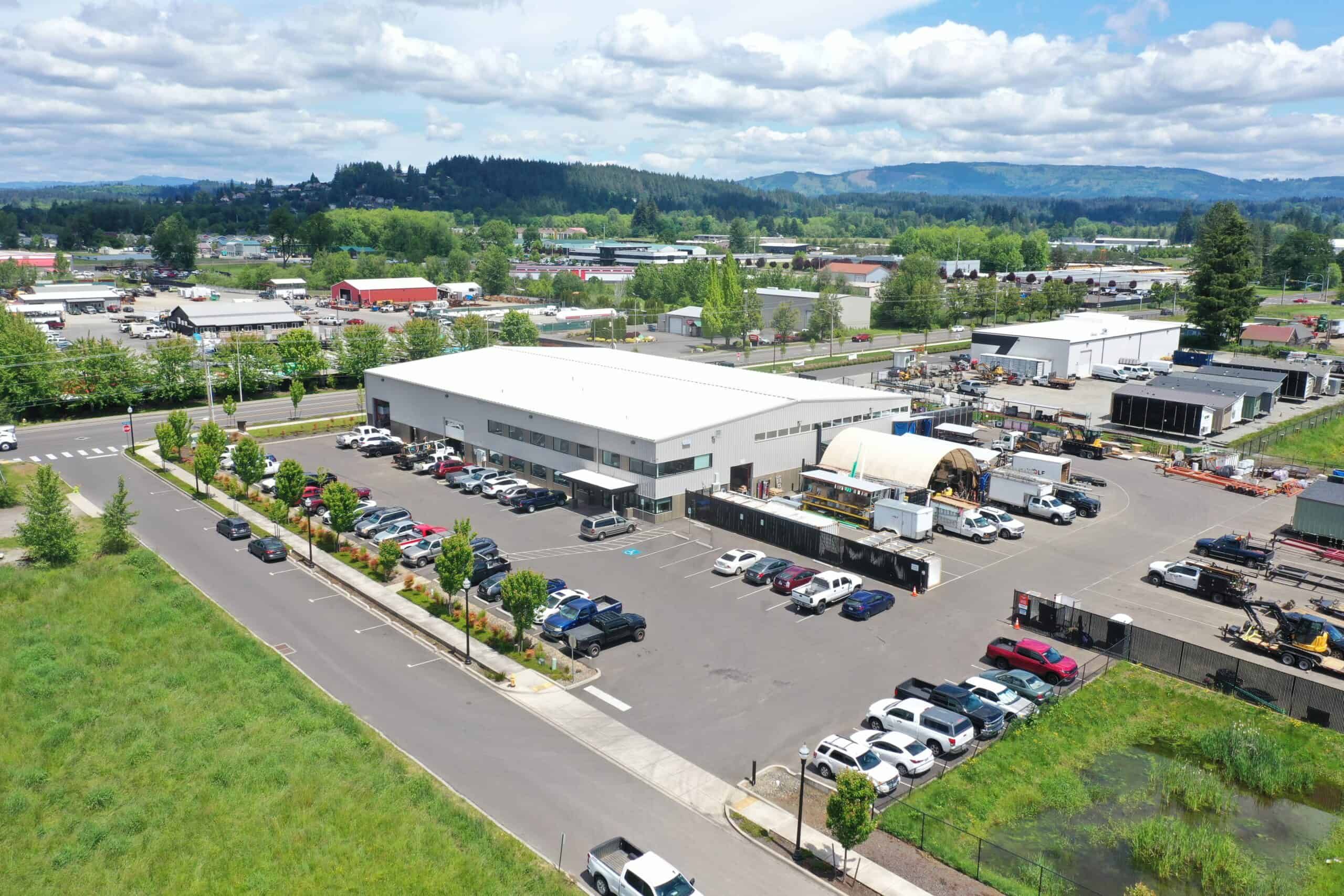 Aerial of the Wolf factory, parking lot, and yard in Battle Ground