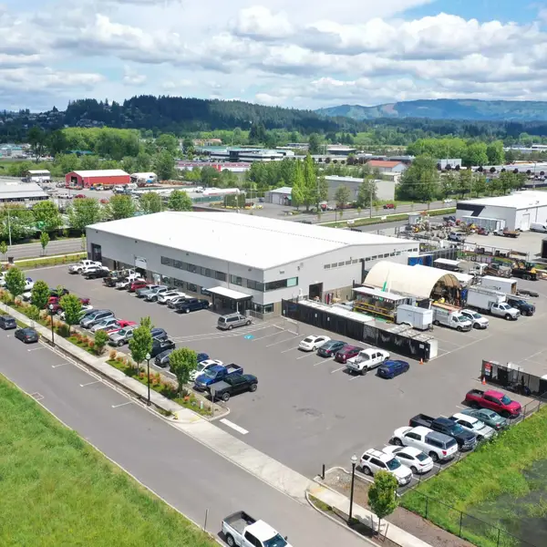 Aerial of the Wolf factory, parking lot, and yard