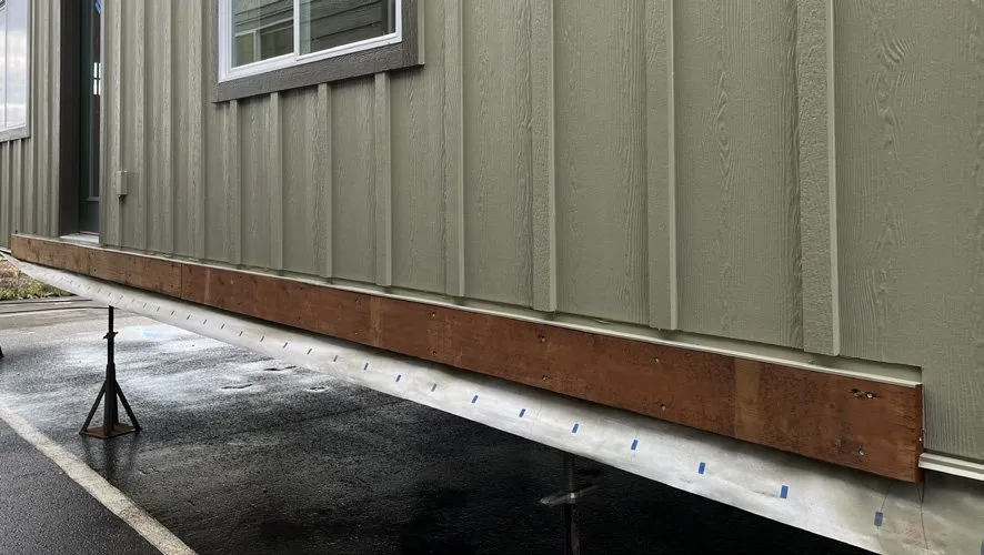 Deck ledger board on the side of a Wolf home