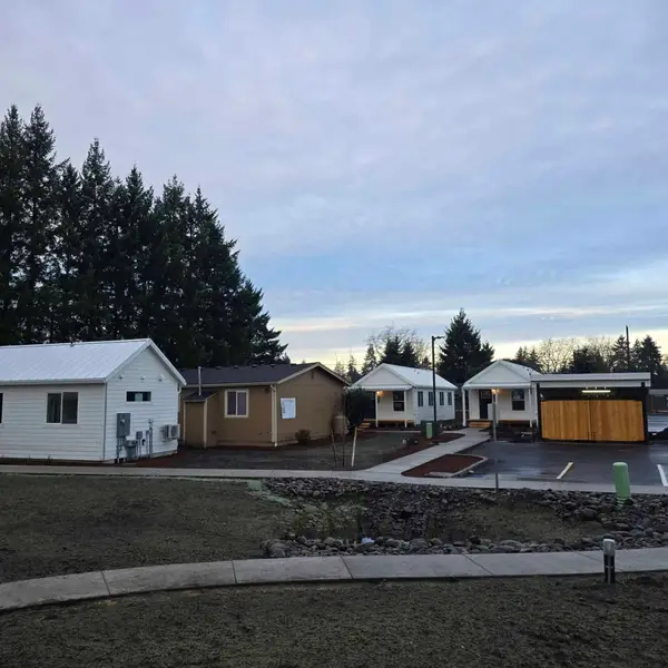 Concrete curbs, sidewalks, and drainage on a Wolf project site