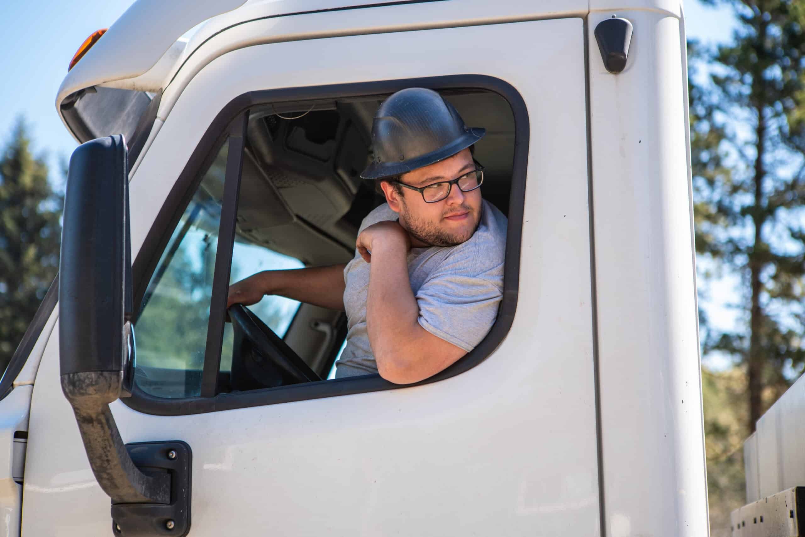 Wolf's field crew guiding a modular home onto its foundation