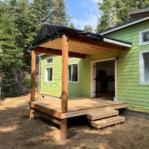 A finished deck and porch on a completed Wolf home