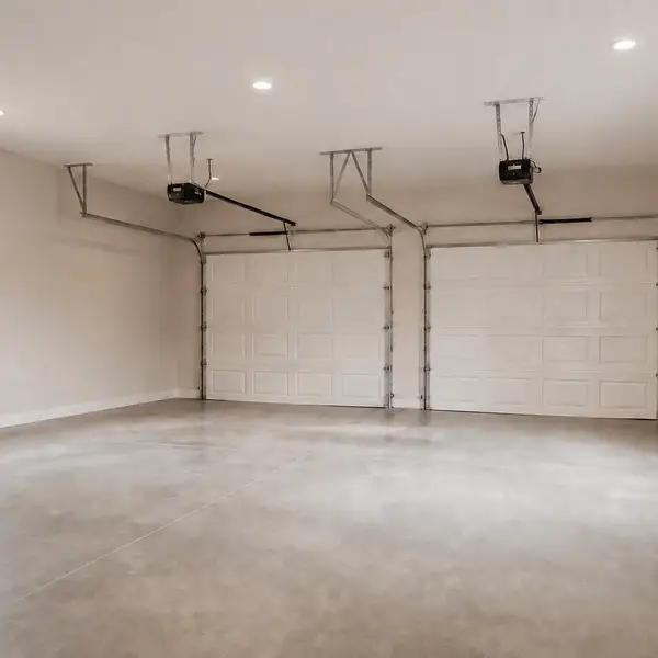 Rendering of the finished garage interior facing the two garage doors on the low-eave wall