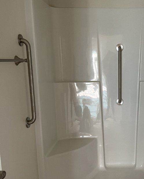 Grab bars in a fiberglass shower