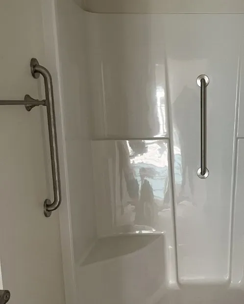 Grab bars in a fiberglass shower