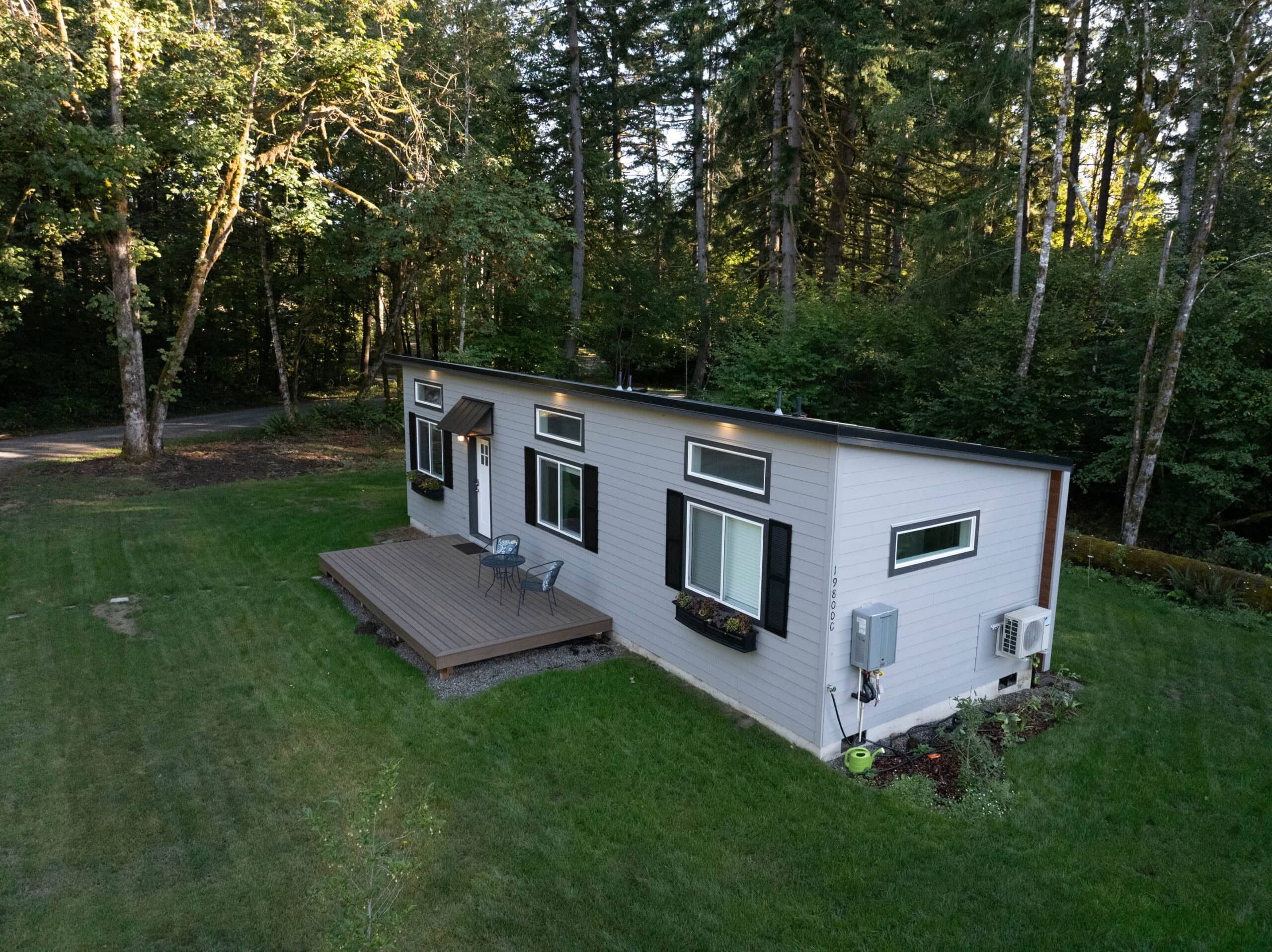 A finished Wolf modular home on a wooded lot — permanent housing for families rebuilding after a wildfire or other disaster