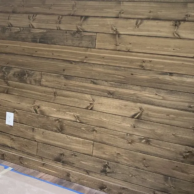 Stained tongue-and-groove pine wall