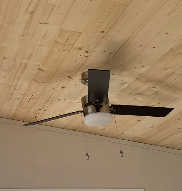 Pine tongue-and-groove ceiling with a ceiling fan