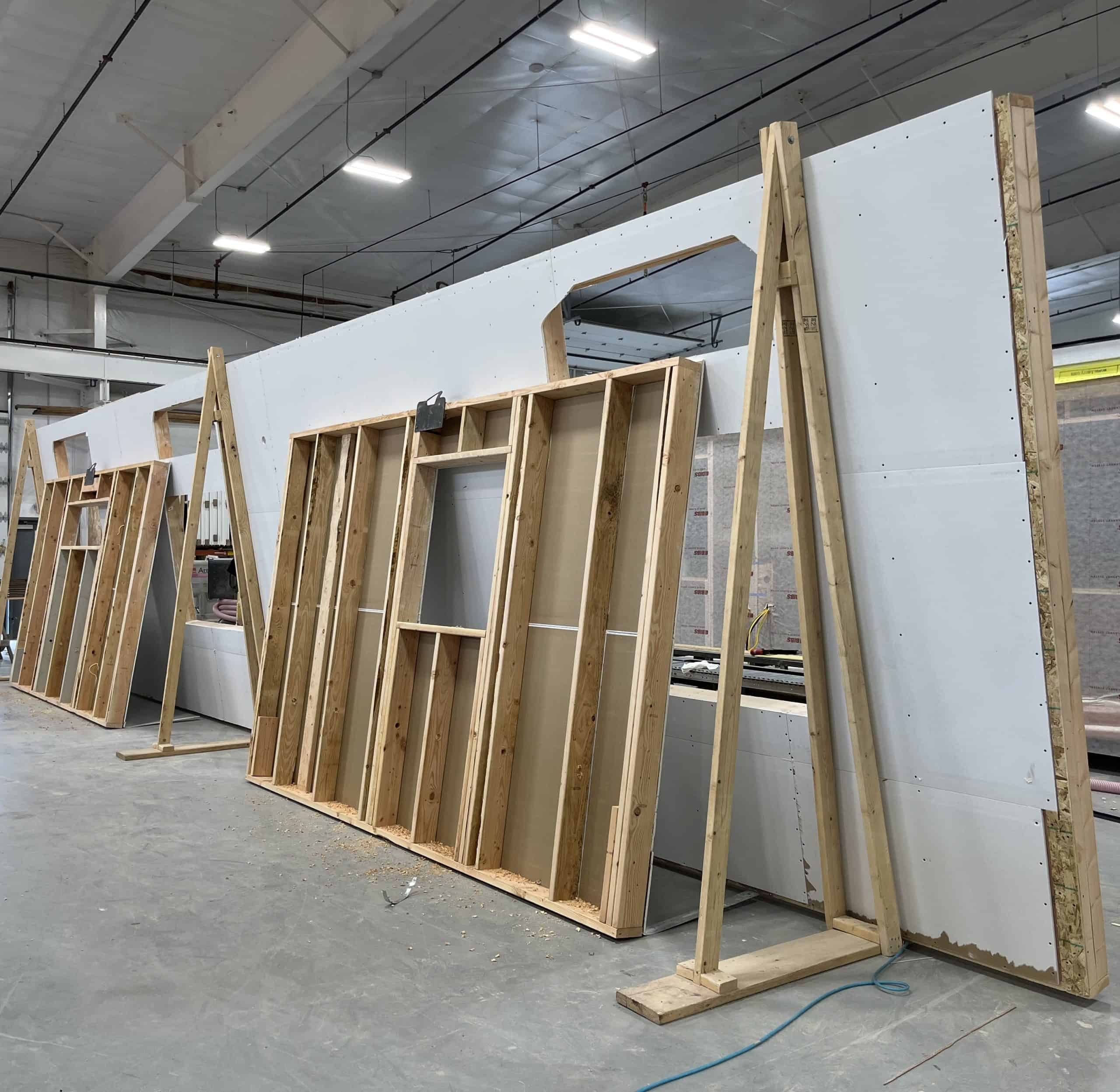 Wall panels framed on the factory floor