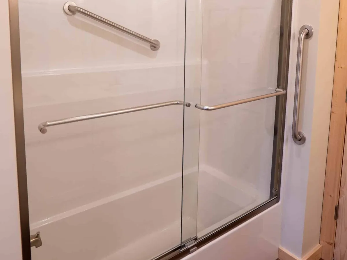 Tub and shower with door