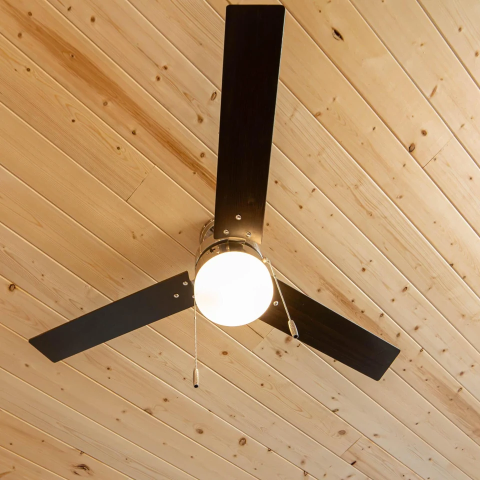 Wolf Model K shiplap ceiling and ceiling fan.