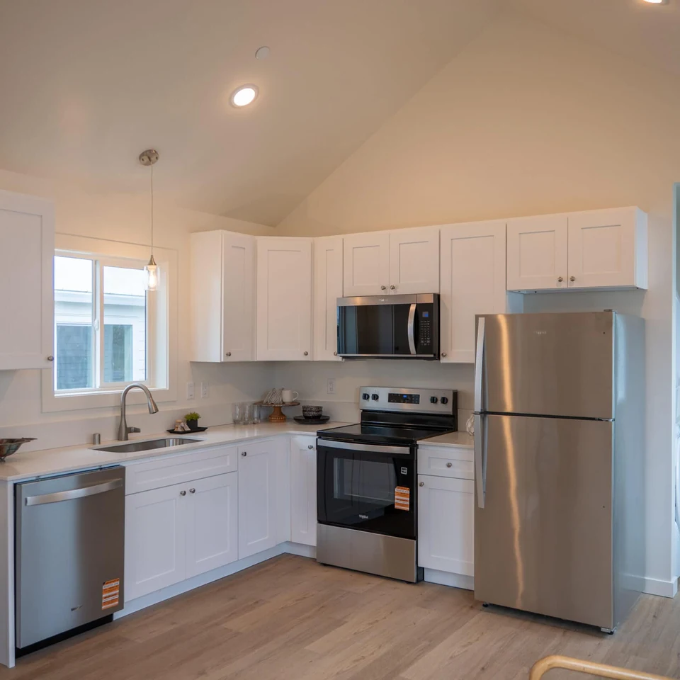 Kitchen in a Wolf Model F home at Orchards District Cottages