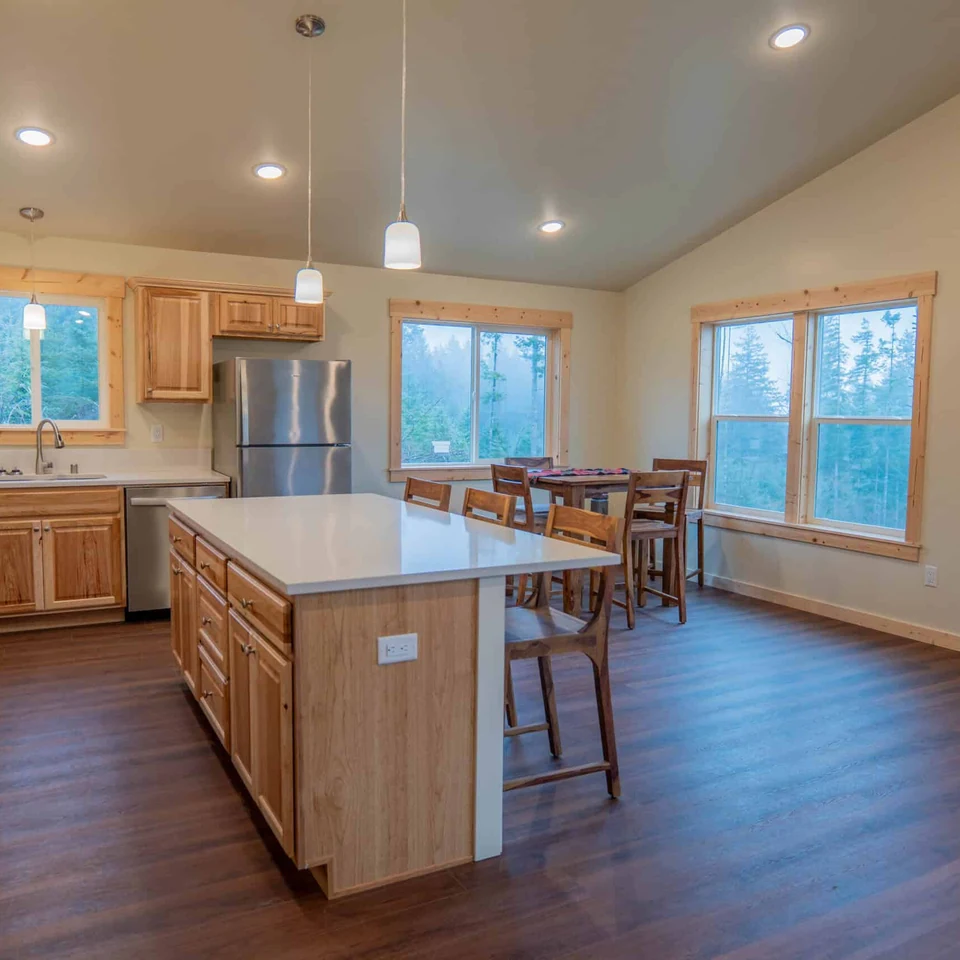Kitchen and dining room in Wolf Model I home.