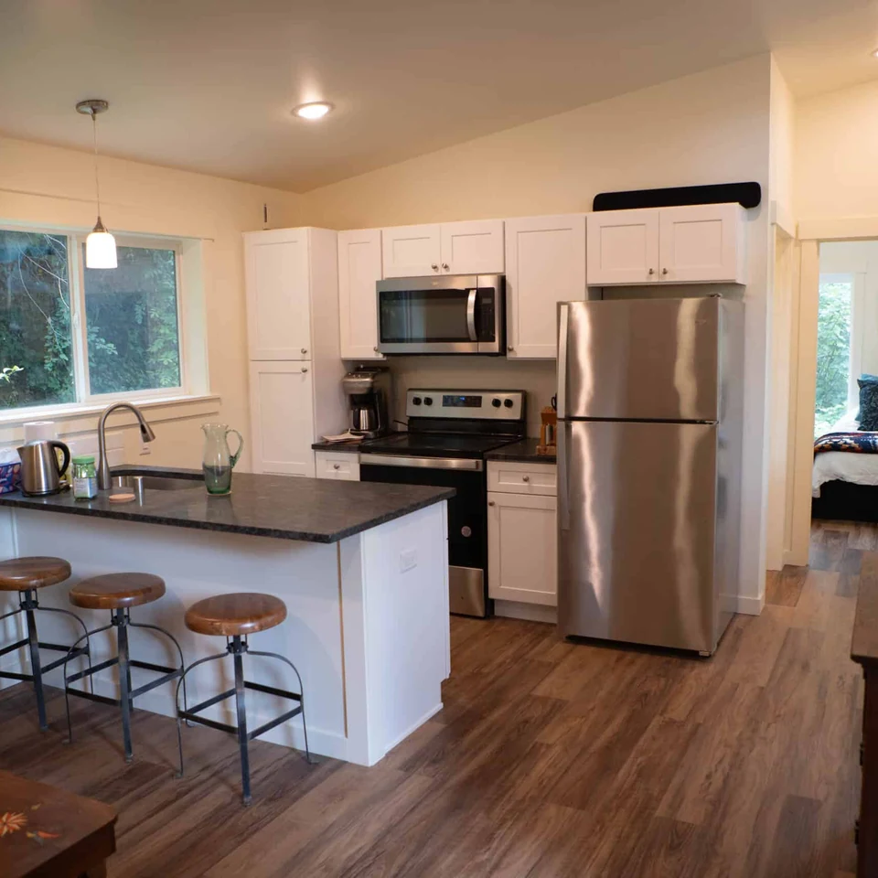 Island kitchen in a Wolf Model E ADU
