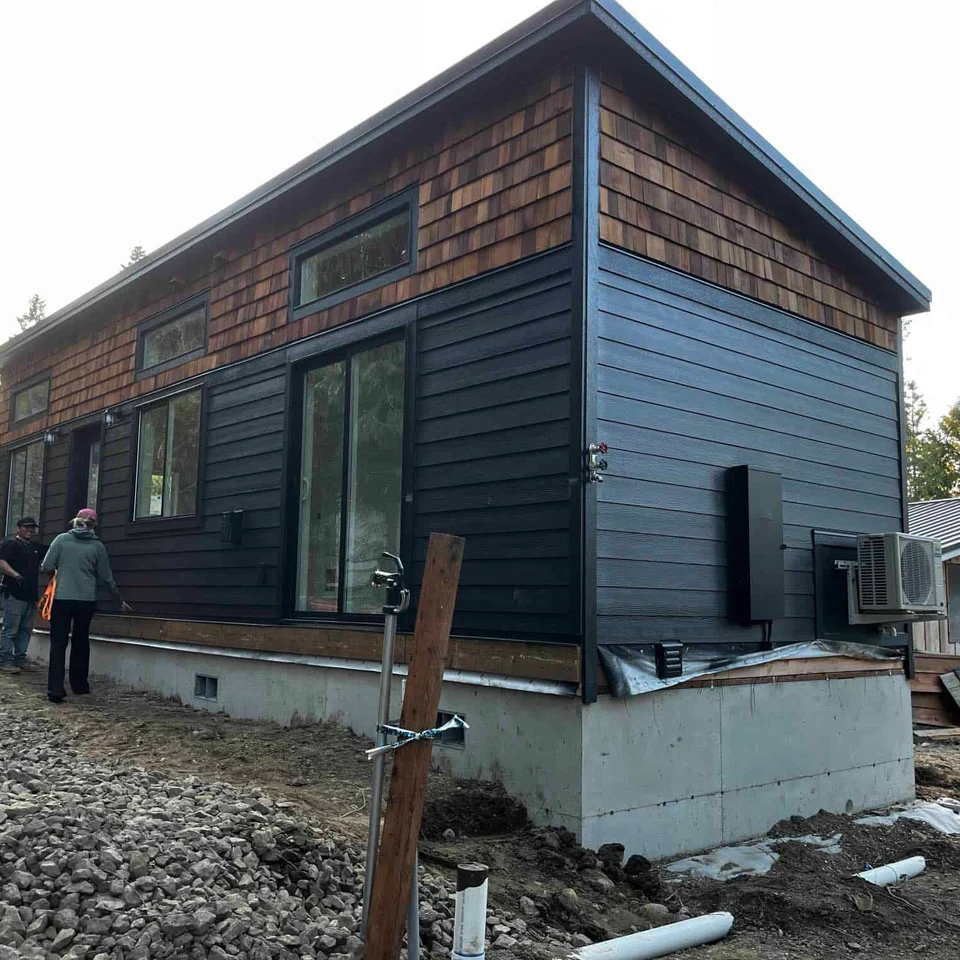 Black Wolf Model K home with cedar shingles.