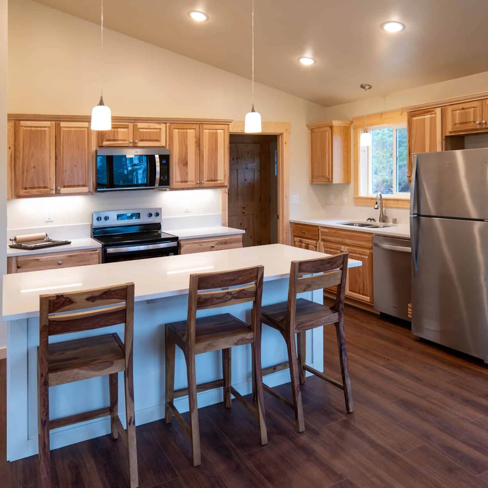 L-shaped island kitchen in a Wolf Model I home.