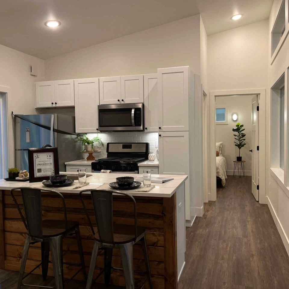 Island kitchen in a Wolf Model E ADU