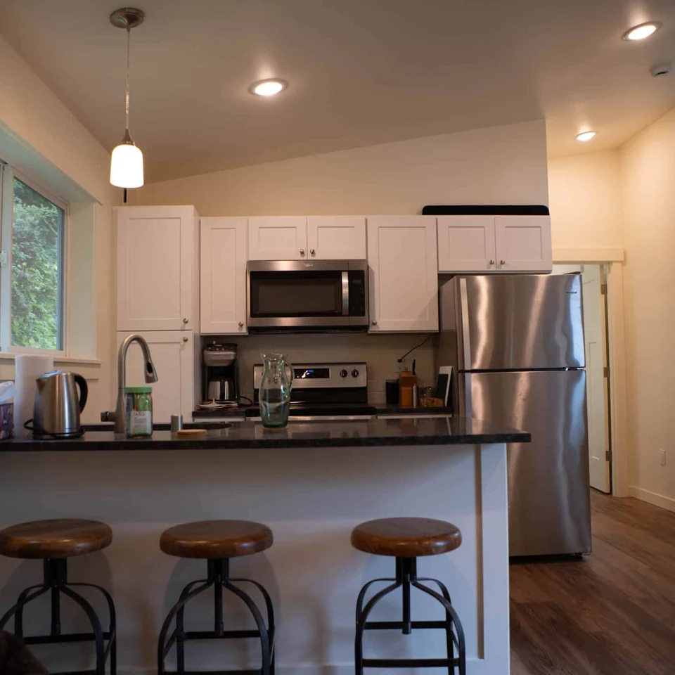 Island kitchen in a Wolf Model E ADU