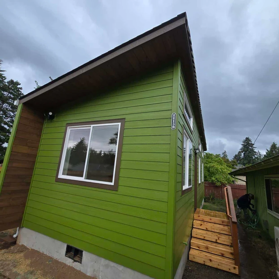 Green and brown Wolf Model K home.