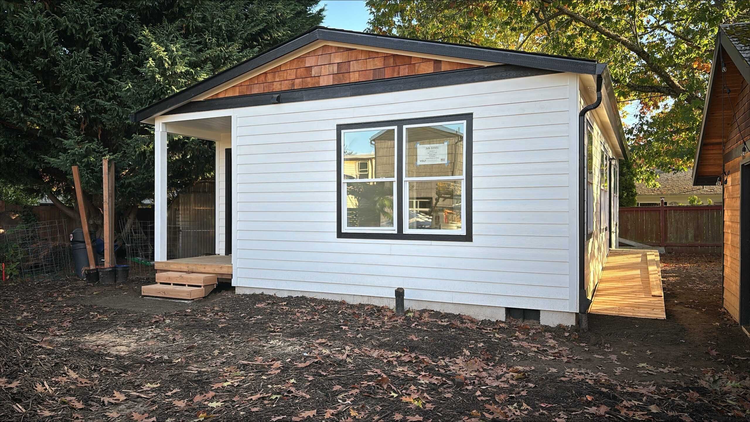 Wolf Model J Home with ramp for accessible entry.