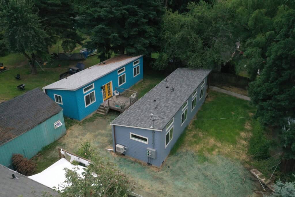 Drone shot of dual Model Fs on same property