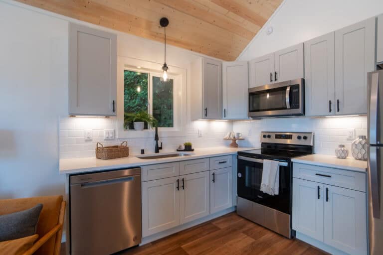 L-shaped kitchen in a Wolf Model F home at Ogden District Cottages