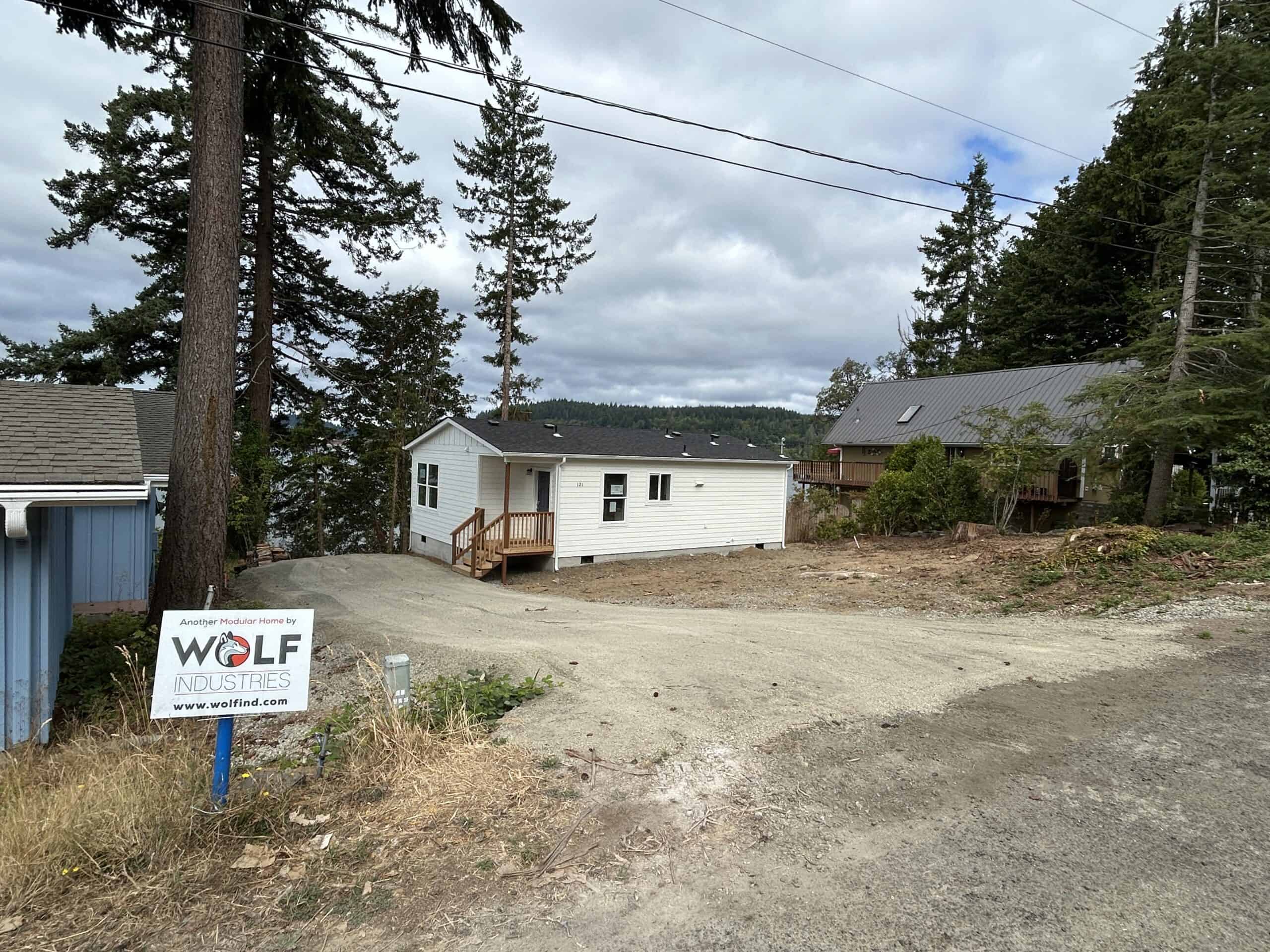 White Model J Wolf home on hillside above Puget Sound.