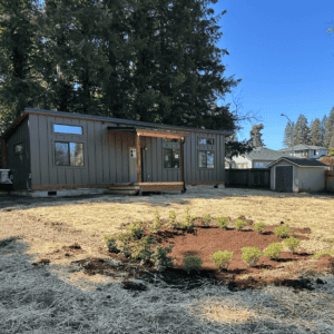 Black Wolf Model E home with covered patio deck.
