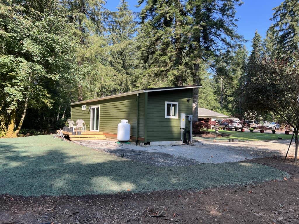 Green and white Wolf Model E home.