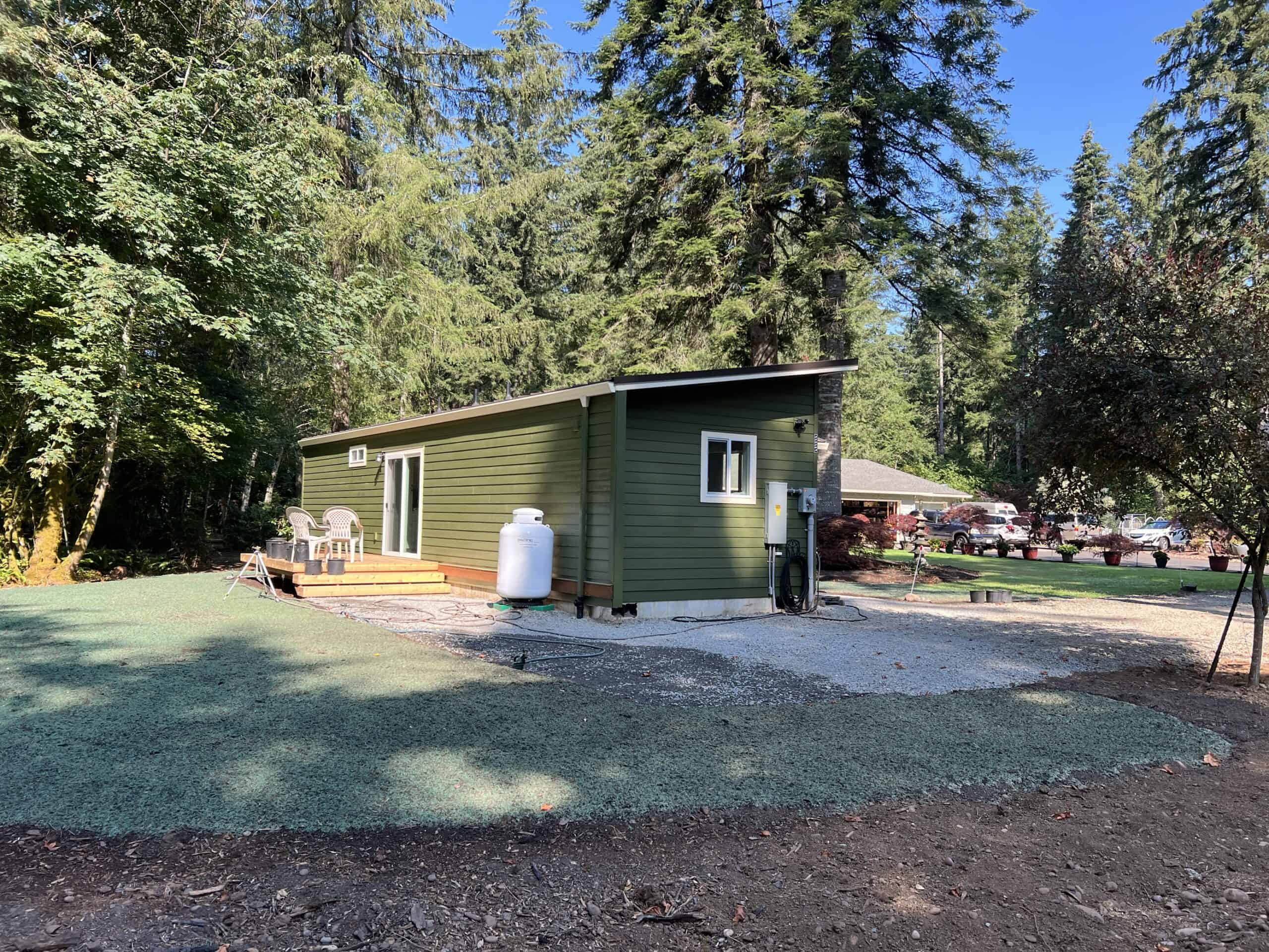 Green and white Wolf Model E home.