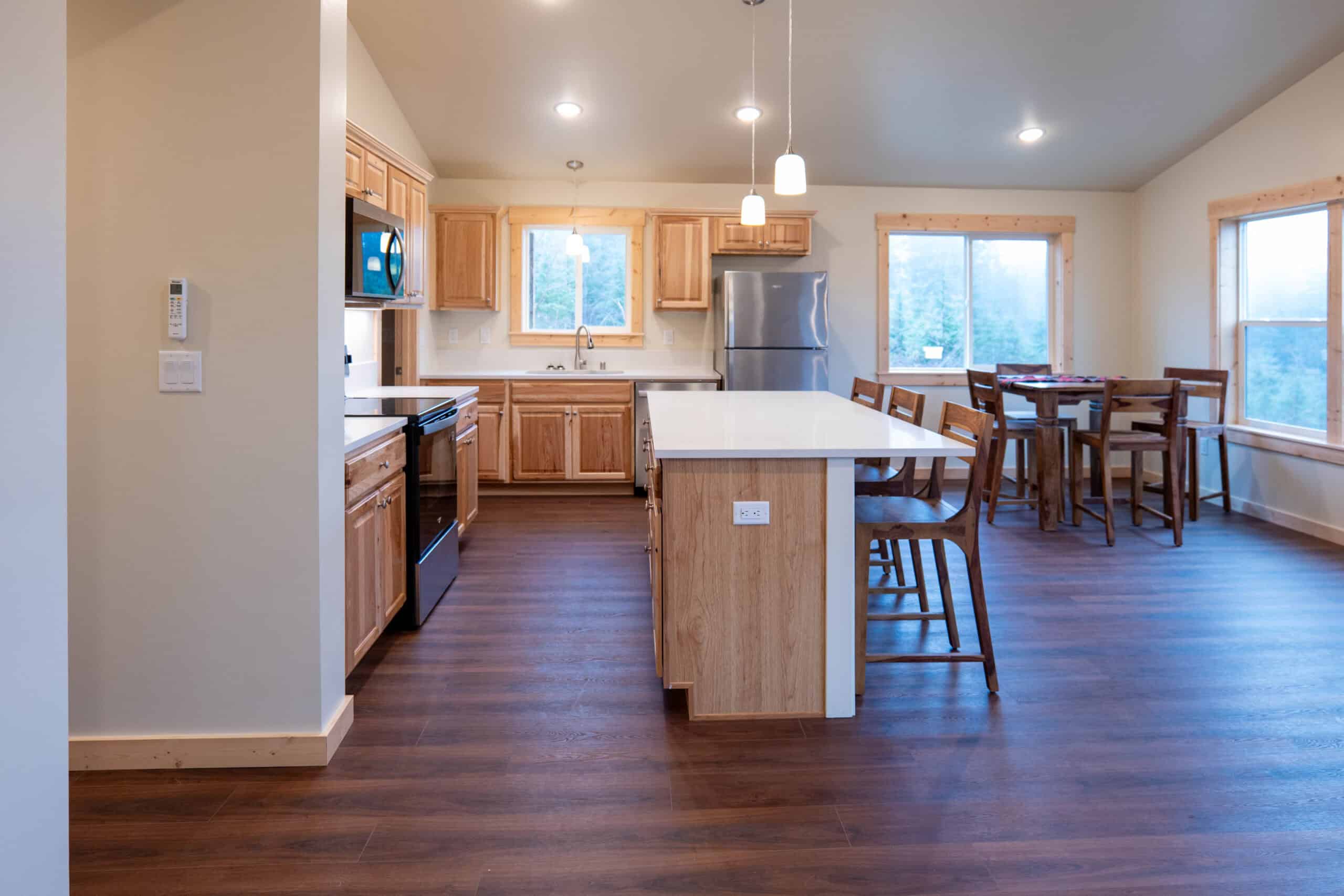 Island kitchen in a Wolf Model I home looking towards dining room.
