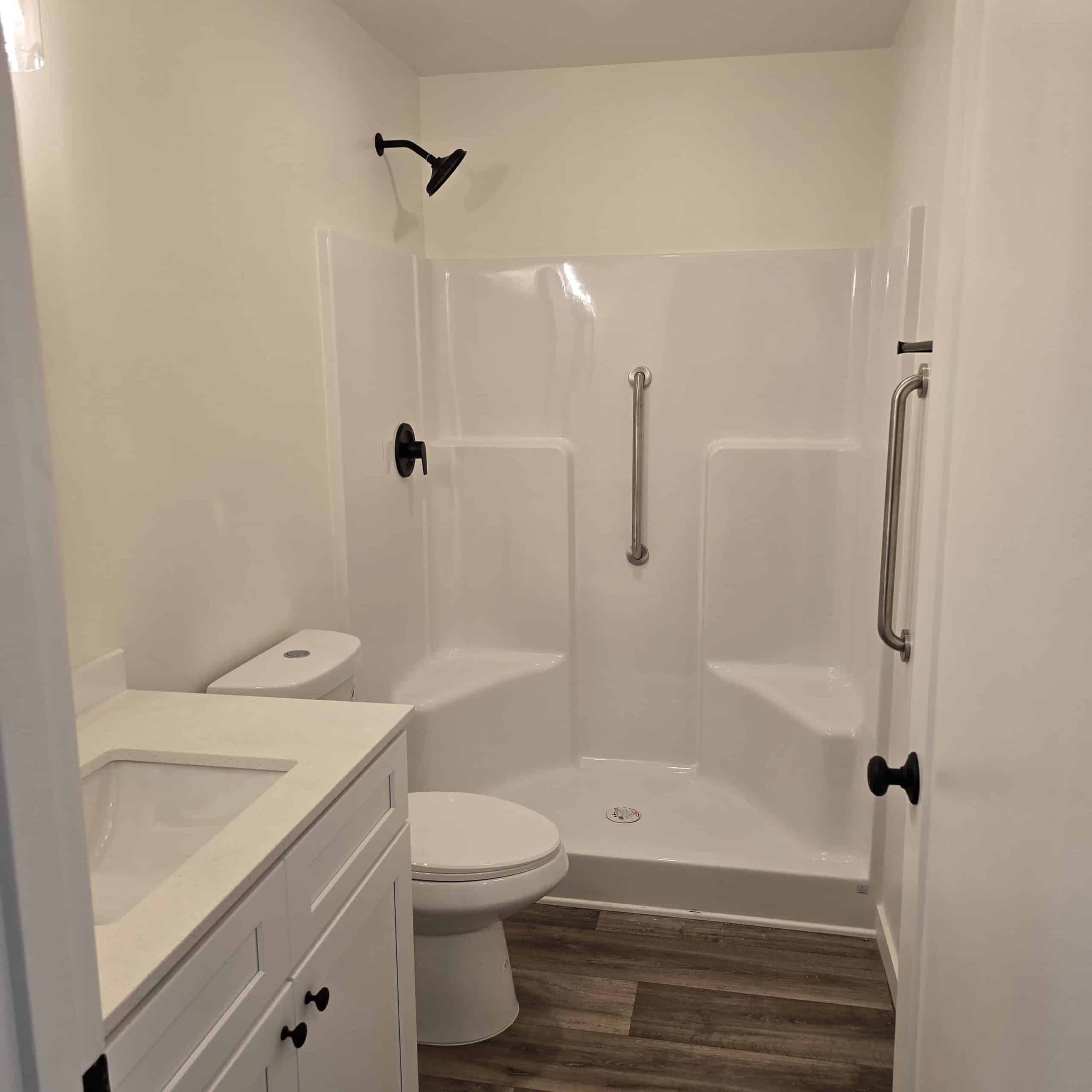 Bathroom with grab bars in Wolf Model F home