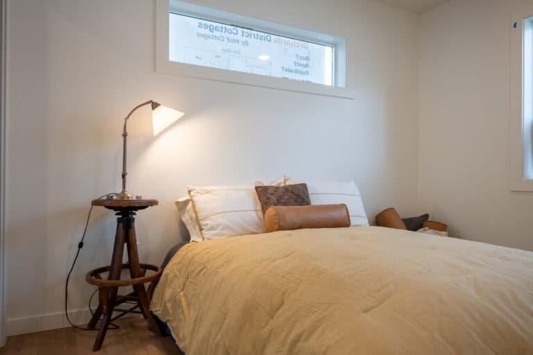Main bedroom with a Wolf Model F home at Orchards District Cottages
