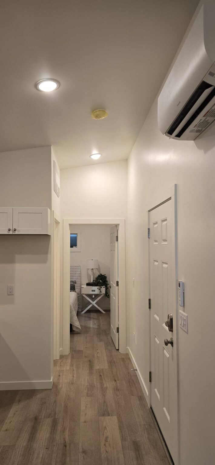 View into main bedroom from entryway in a Wolf Model E home.
