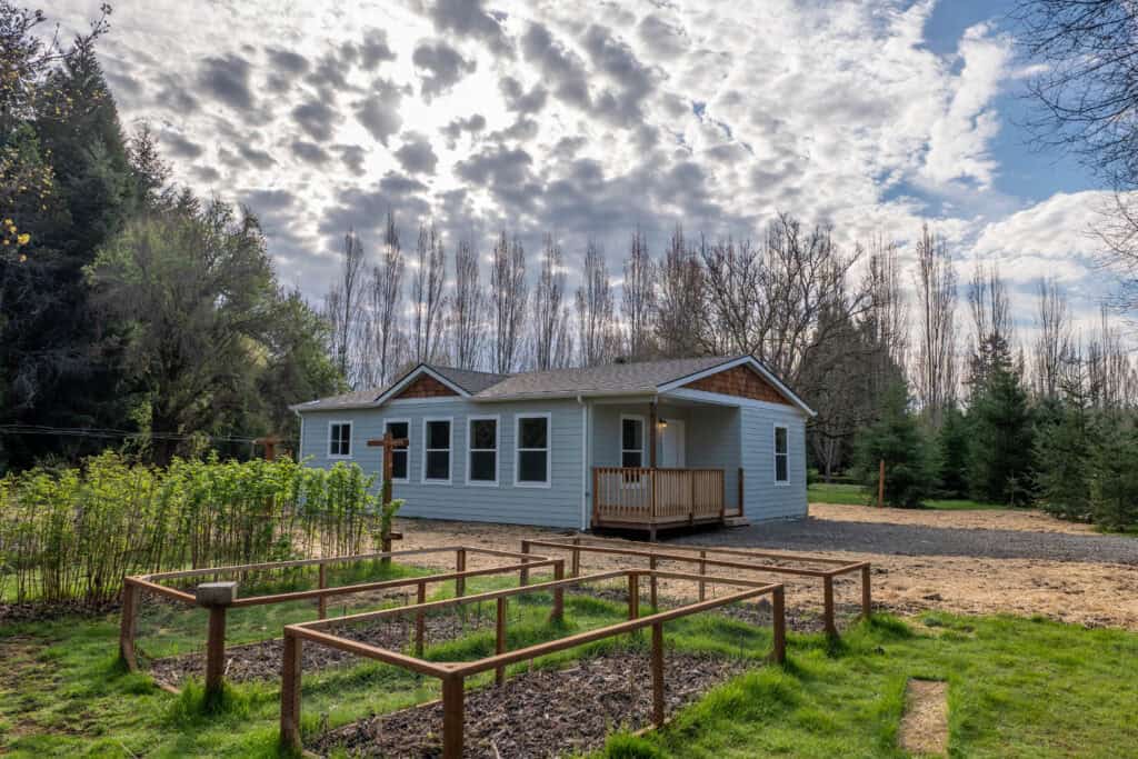 Model L Wolf Home with Covered Front Porch Deck