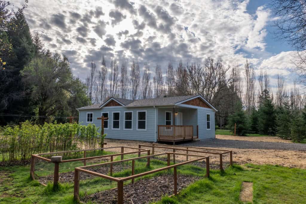 Model L Wolf Home with Covered Front Porch Deck