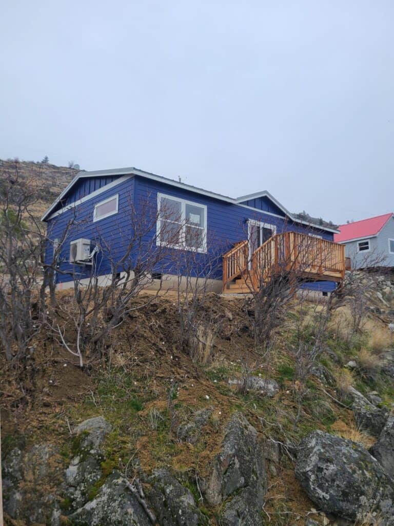 Blue and White Wolf Model J Modular Home on Lake Chelan