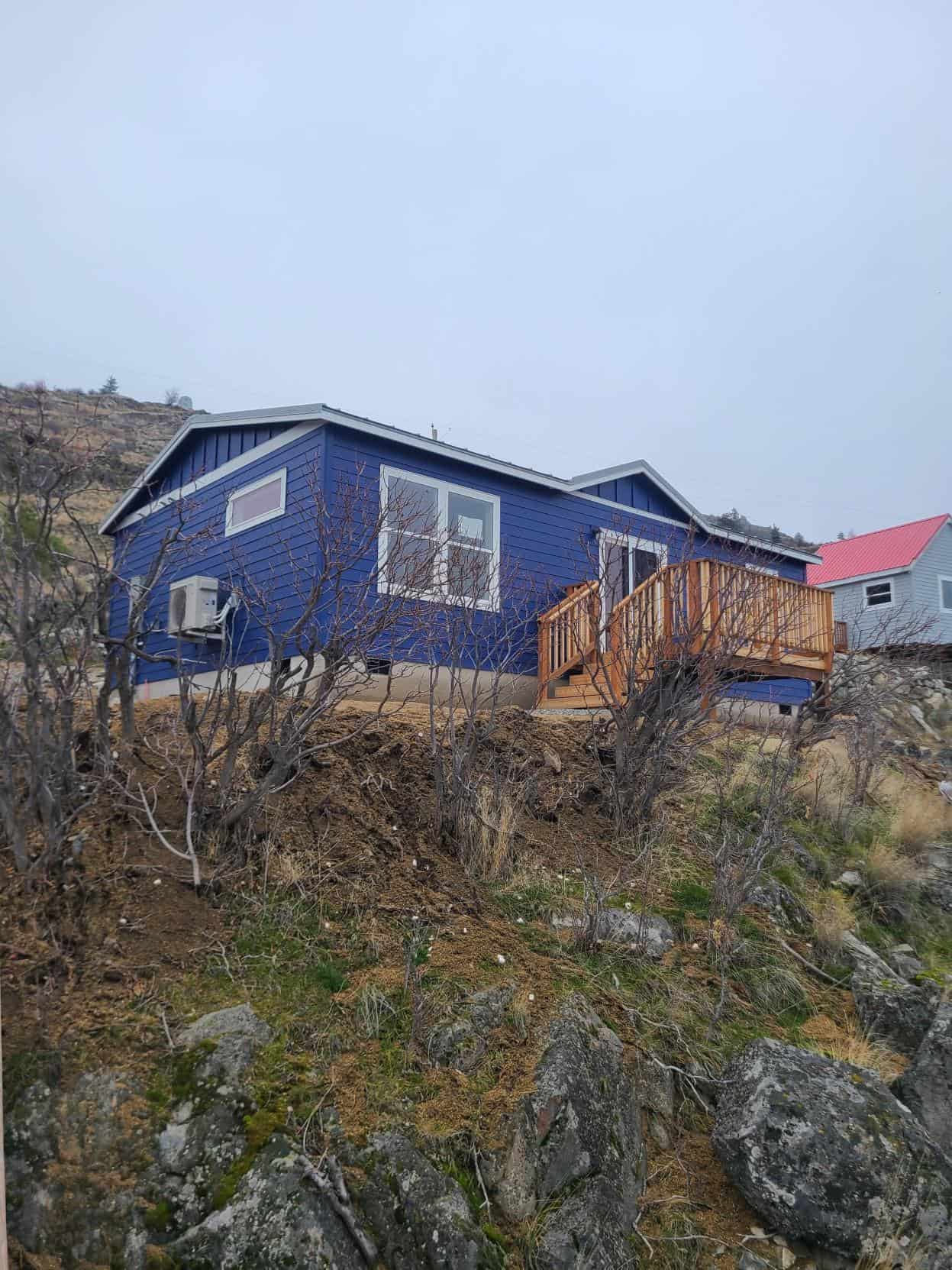 Blue and White Wolf Model J Modular Home on Lake Chelan