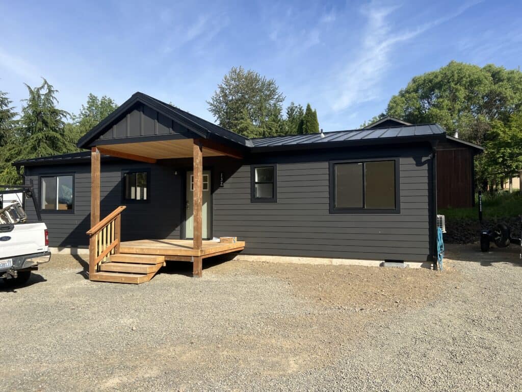 Black Wolf Model I modular home with covered entry in Mossy Rock WA.