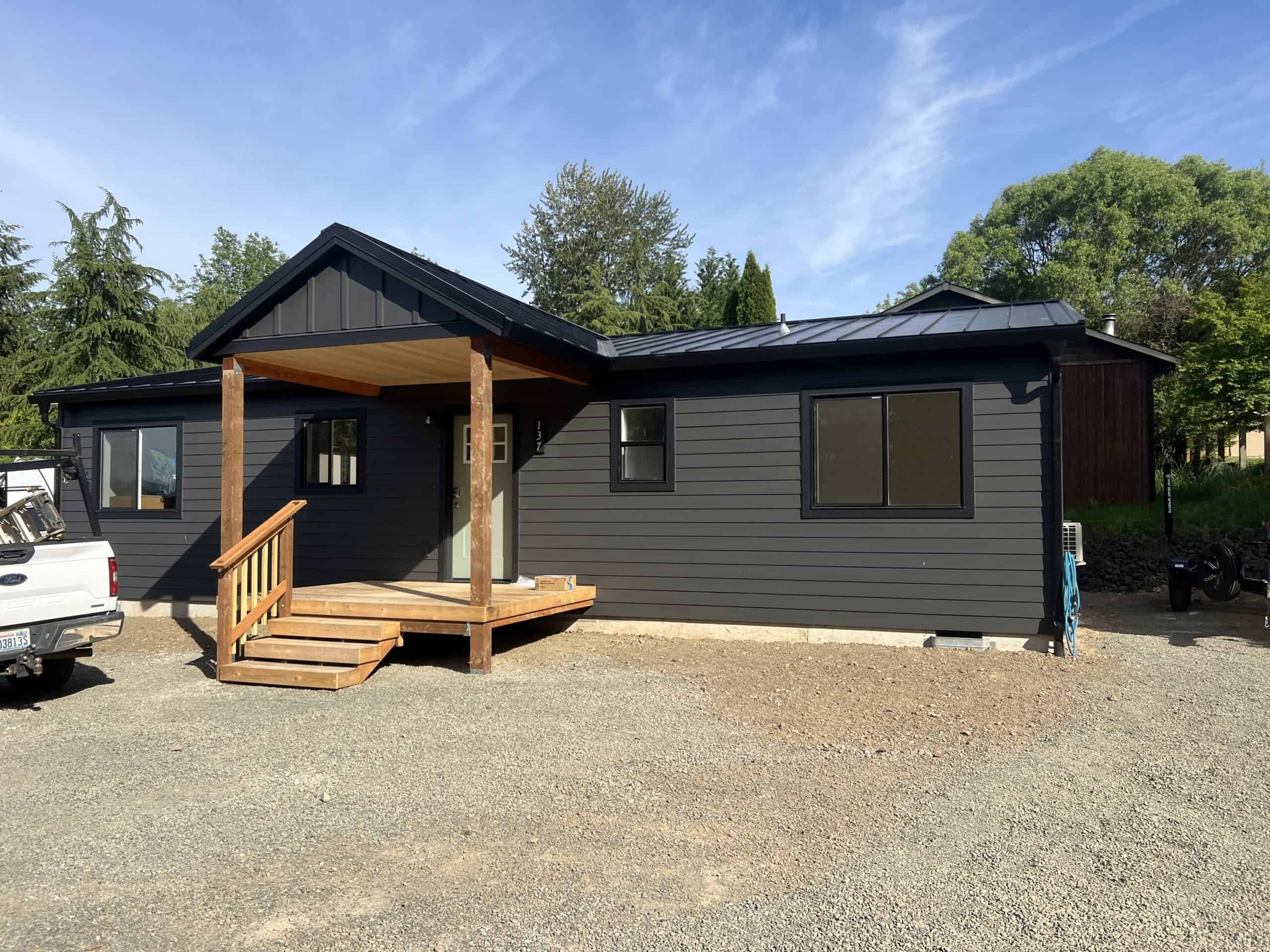 Black Wolf Model I modular home with covered entry in Mossy Rock WA.