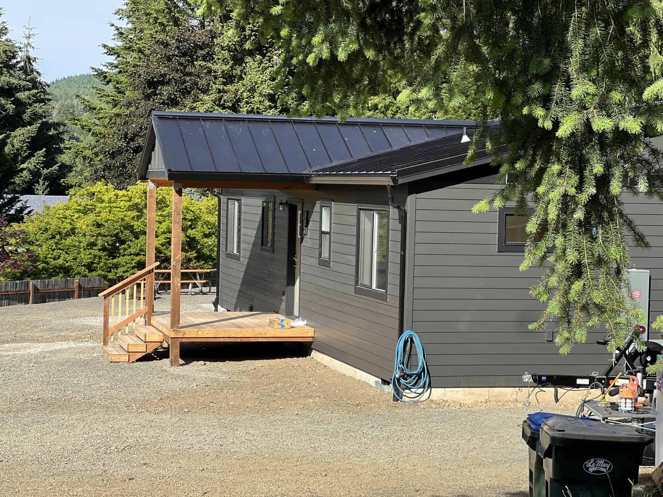 Covered porch on a Wolf Model I modular home in Mossy Rock WA.