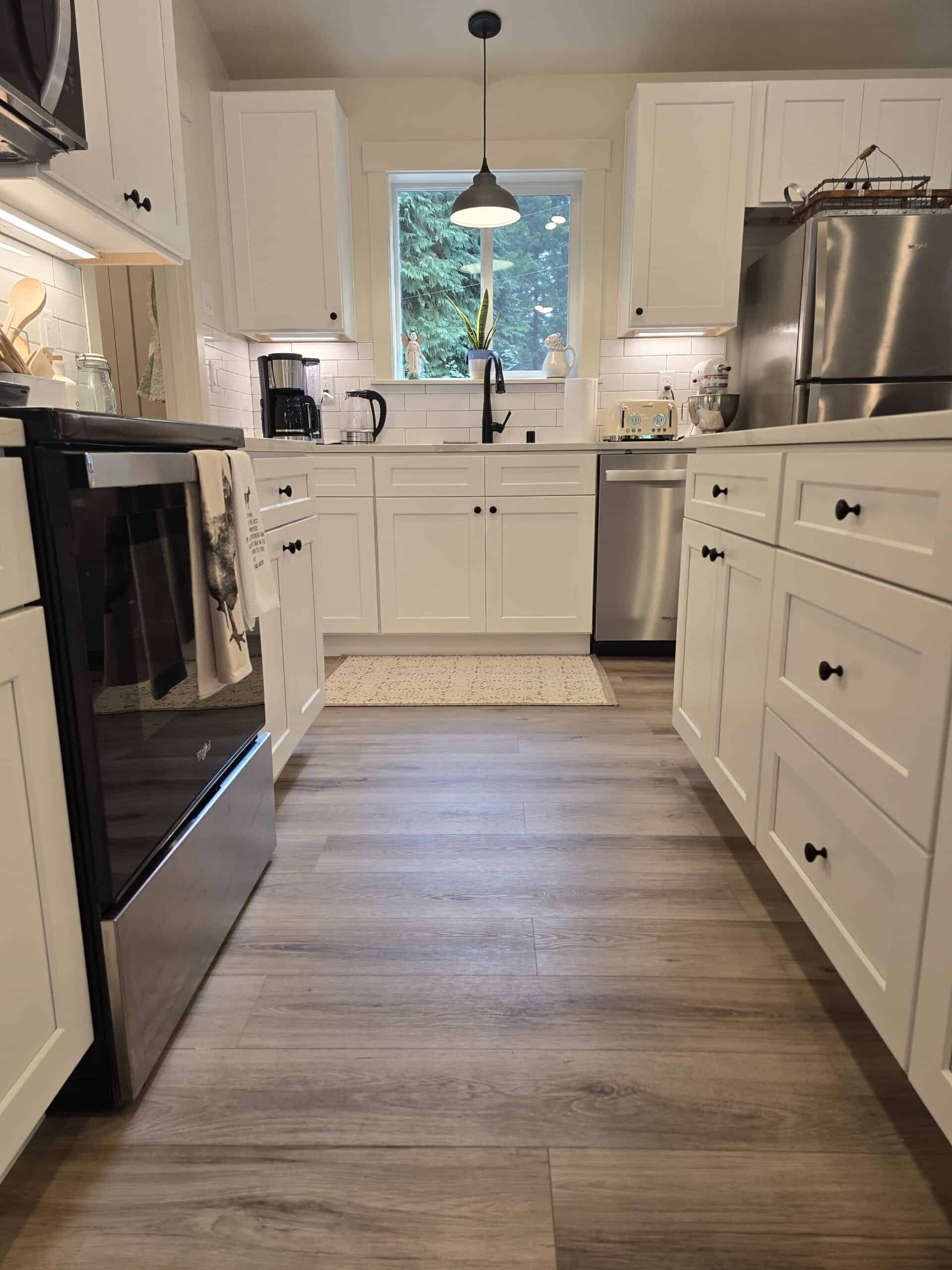 View down the kitchen galley in a Wolf Model I modular home.