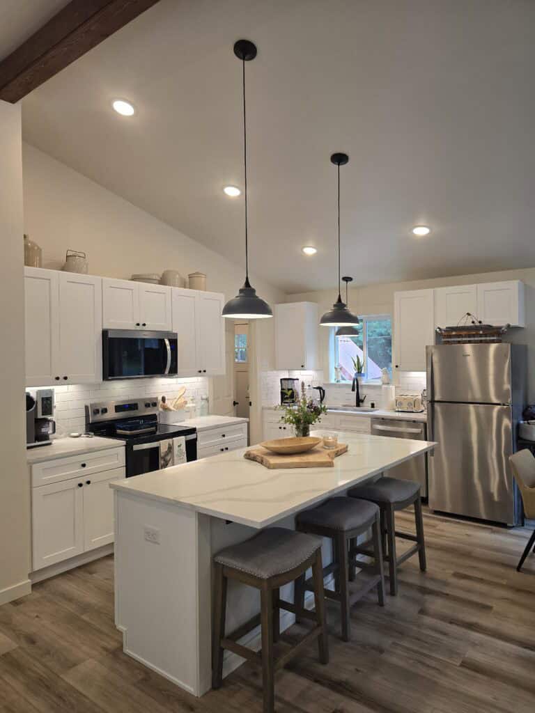 L-shaped island kitchen in a Wolf Model I modular home.