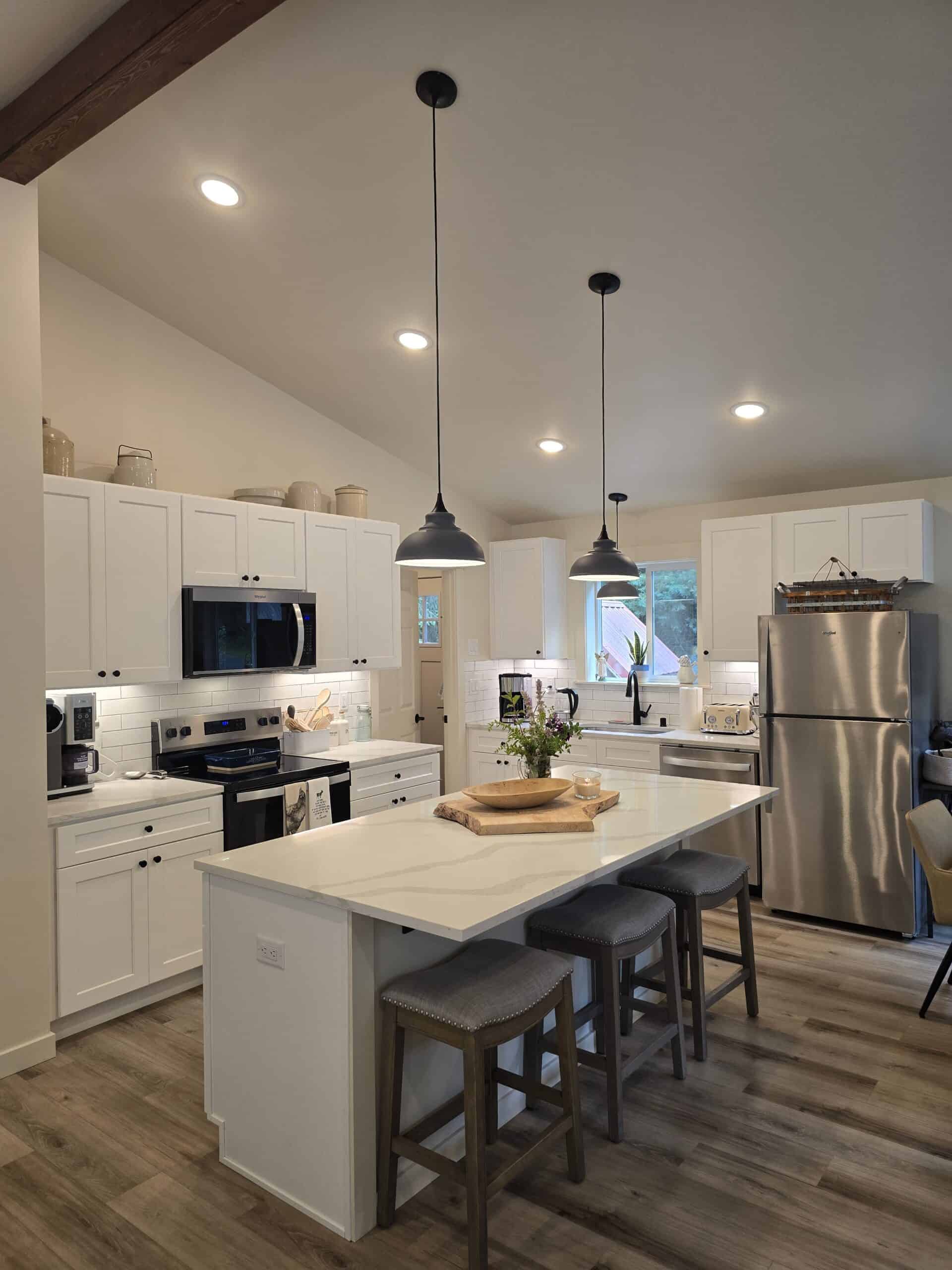 L-shaped island kitchen in a Wolf Model I modular home.